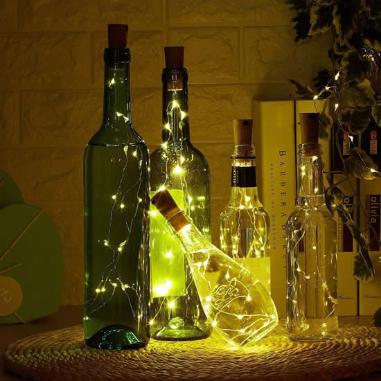 Décoration avec bouteilles en verre et clignotant pour Noël