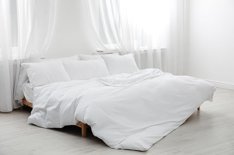 AdobeStock_244833183 Comment identifier les meilleures marques de literie de luxe pour votre maison
