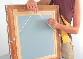 Comment accrocher une toile lourde ?