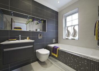 Comment égayer une salle de bain grise ?