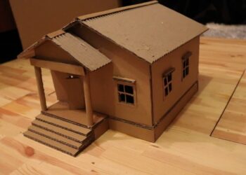 Comment faire une petite maison de Noël en carton ?