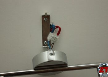 Comment fixer une applique murale sans percer ?